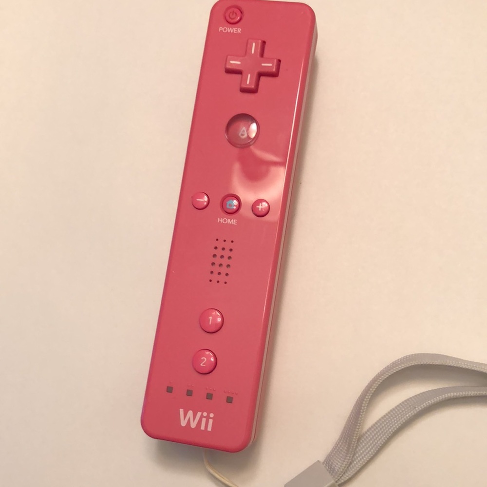 Nintendo Wii game controller remote pink